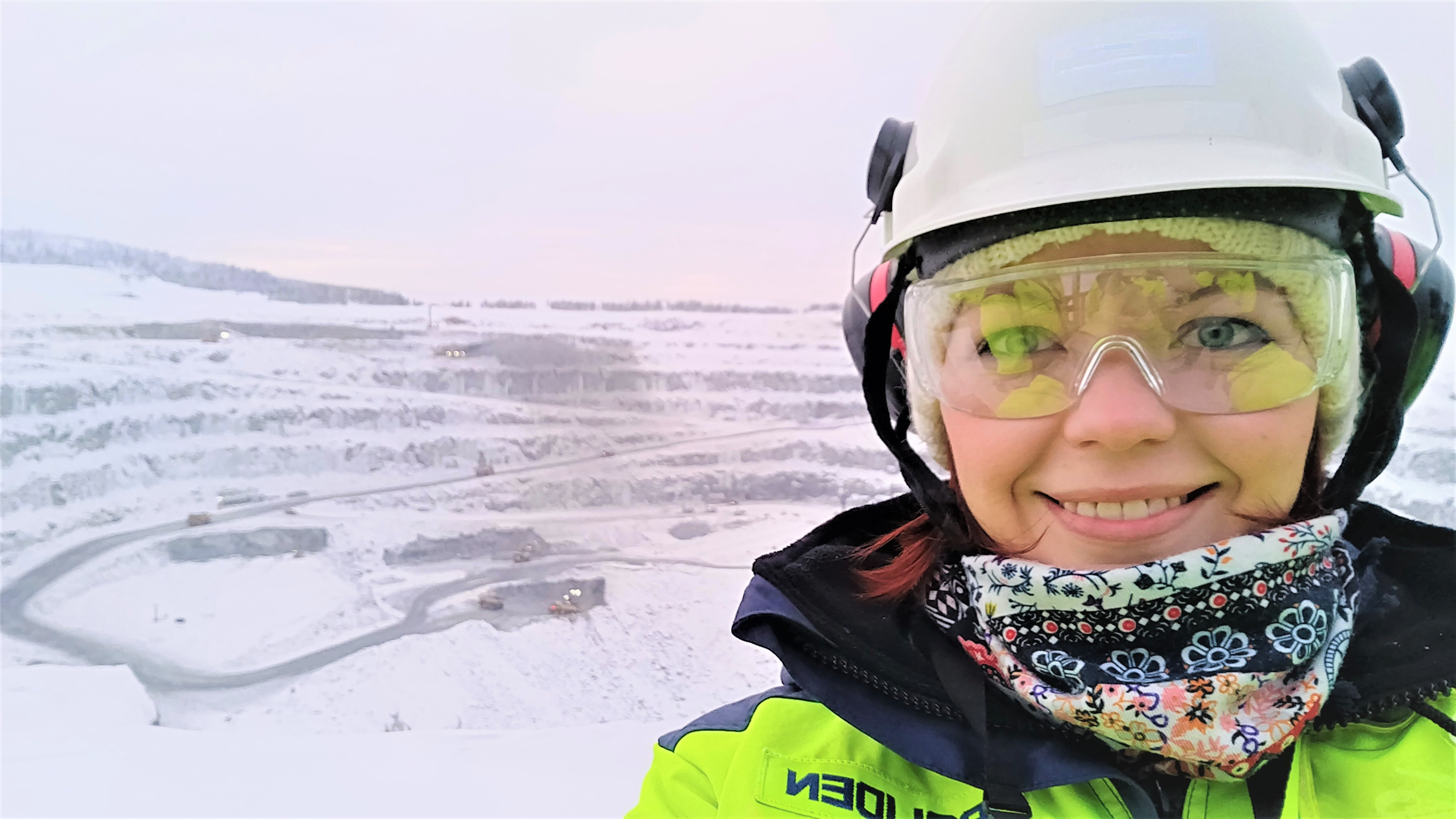 a woman aside of an open pit