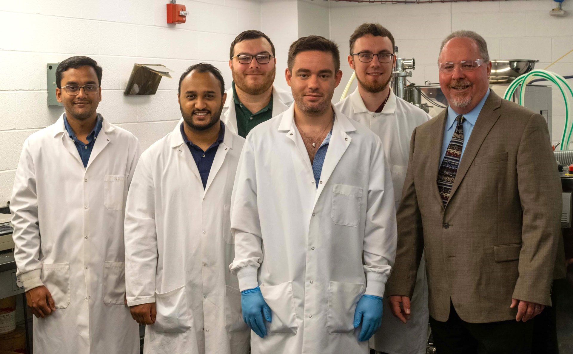 group-photo-carl-anderson-and-his-team
