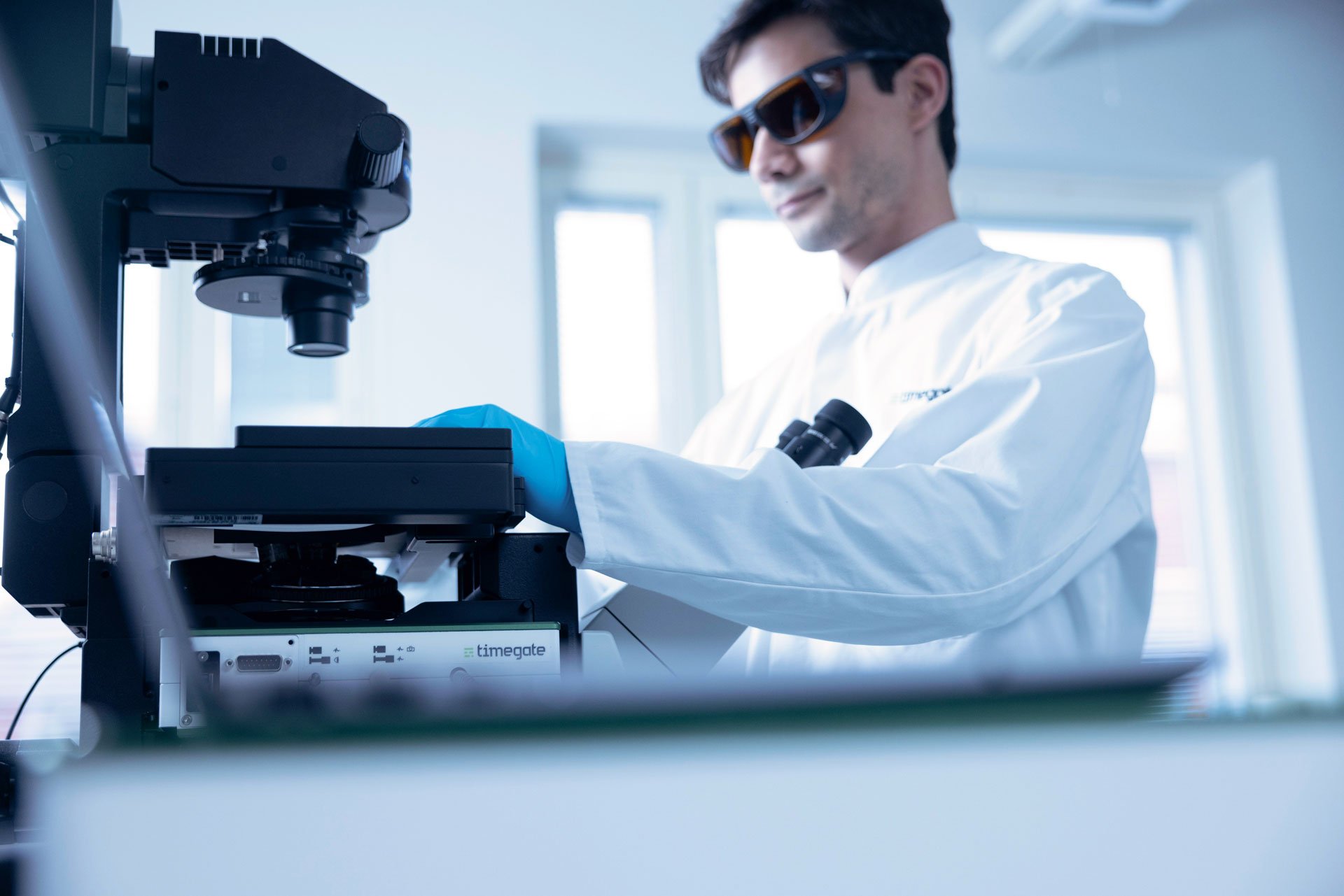 Scientist using MicroPlate HTS System