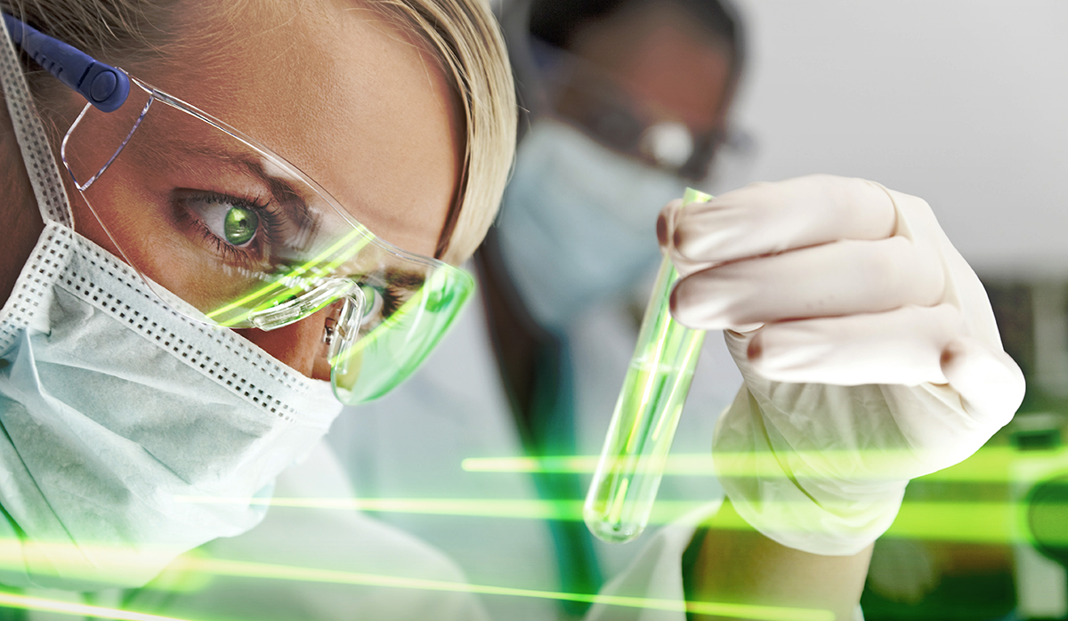 Woman holding a biopharmaceutical liquid with time-gated lazer light.