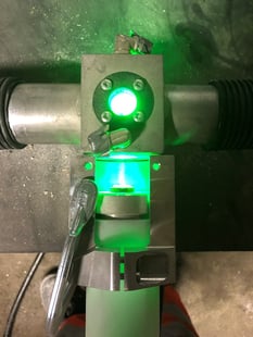 Measurement chamber illuminated by laser