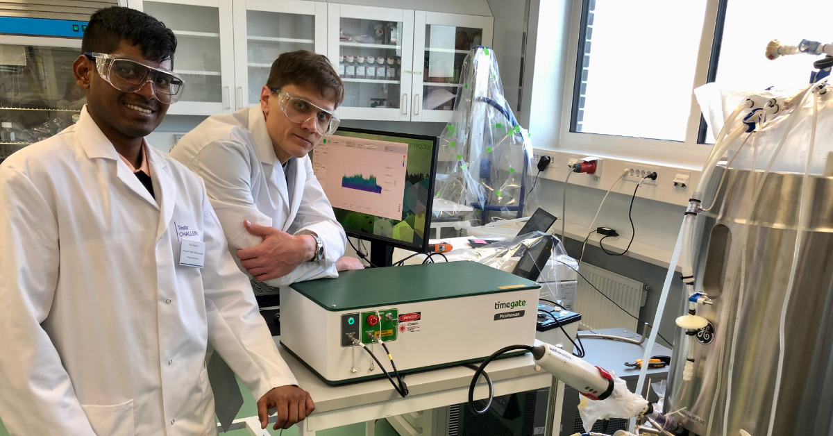 Timegators next to a bioreactor with PicoRaman instrument.