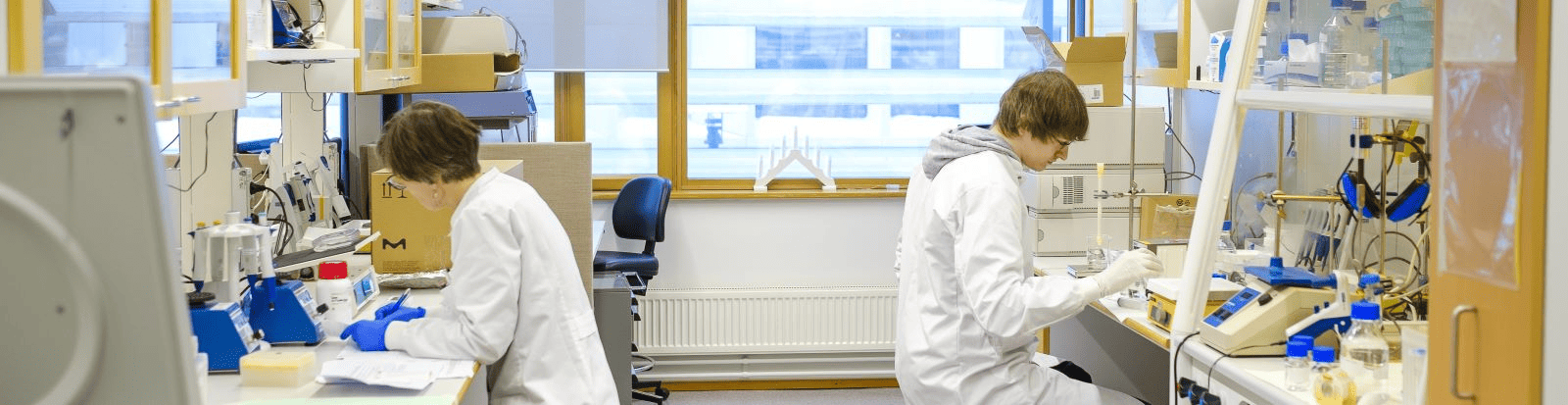 Two scientists working in the Finnish Red Cross Blood Service laboratory.